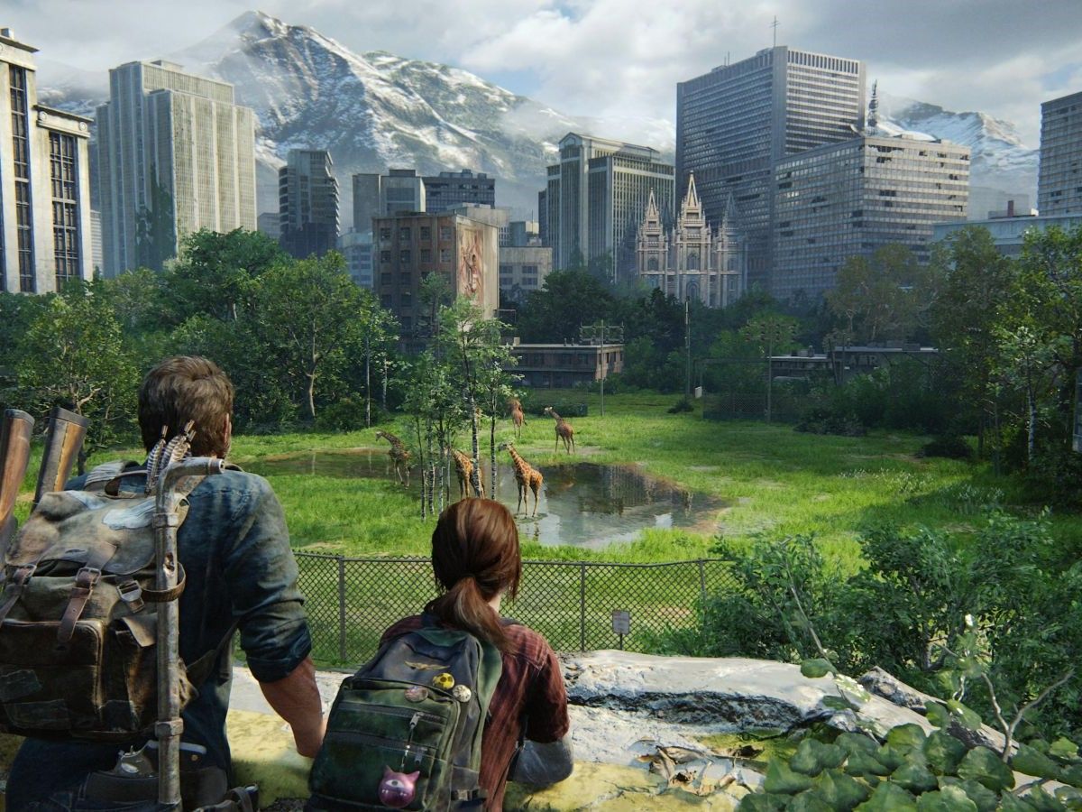 Joel and Ellie in a scene from the video game, 'The Last of Us' (2013) They stand outside overlooking a park where five giraffes are roaming free in the middle of the city. We see Joel and Ellie from behind. Joel is a white man who has short, brown hair, is wearing a greenish buttondown shirt with the sleeves rolled up, and has a brown backpack on his back with a pipe and two rifles affixed to it. There are arrows sticking out of his backpack. Ellie is a white teenage girl with long brown hair in a ponytail. She has a green backpack with buttons affixed to it, and wears a red t-shirt. 