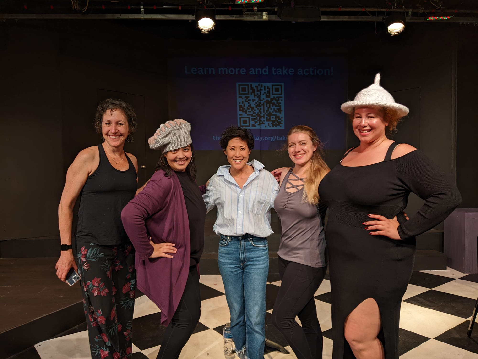 Image of five women - a white woman, a Latina, an Asian woman, a white woman, and a mixed-race woman posing and smiling together. 